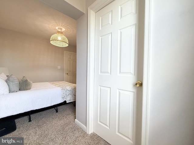 bedroom with light colored carpet