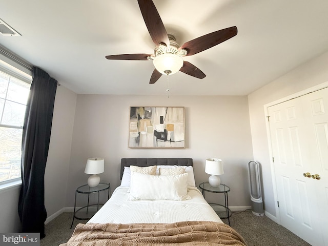 carpeted bedroom featuring ceiling fan