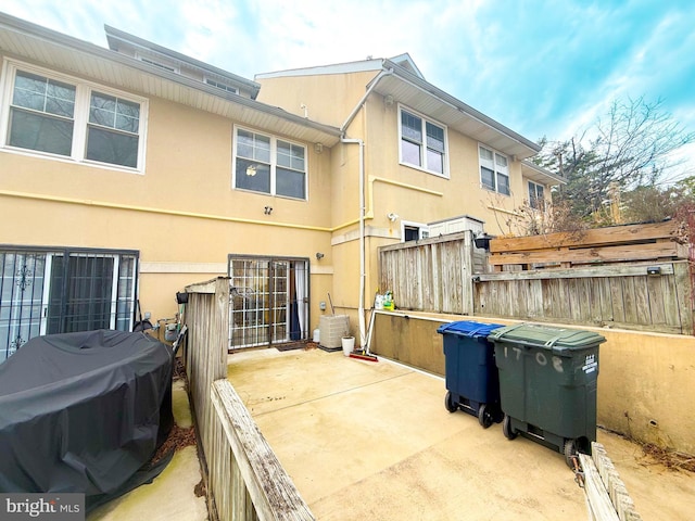 rear view of house featuring a patio