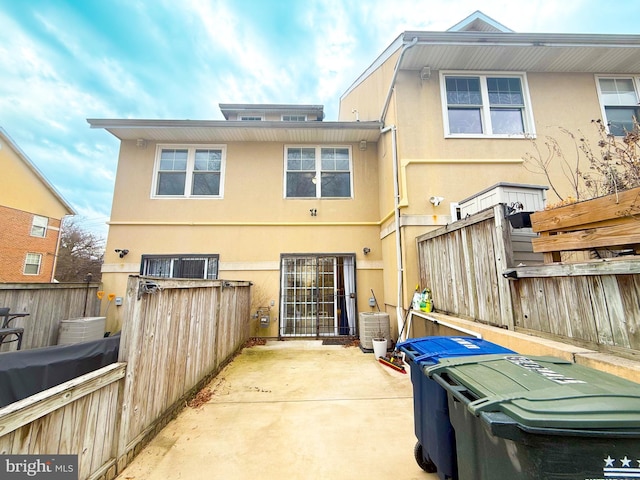 back of house featuring a patio