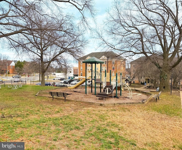 view of playground with a yard