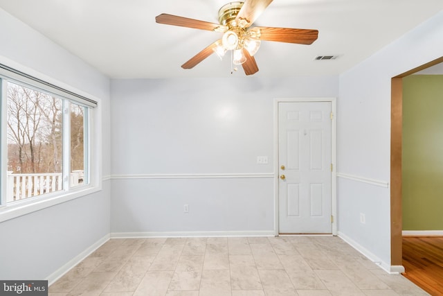 empty room with ceiling fan