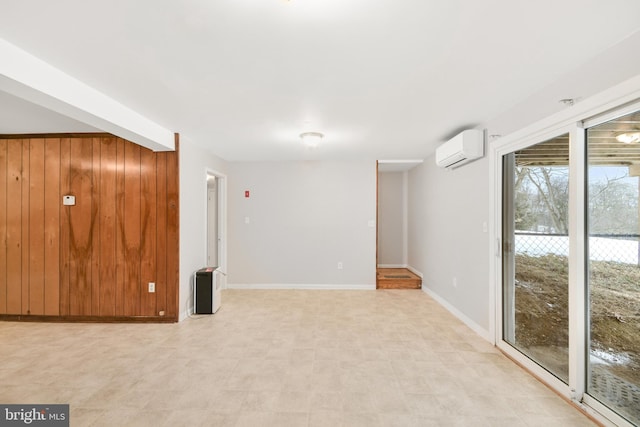 empty room featuring an AC wall unit