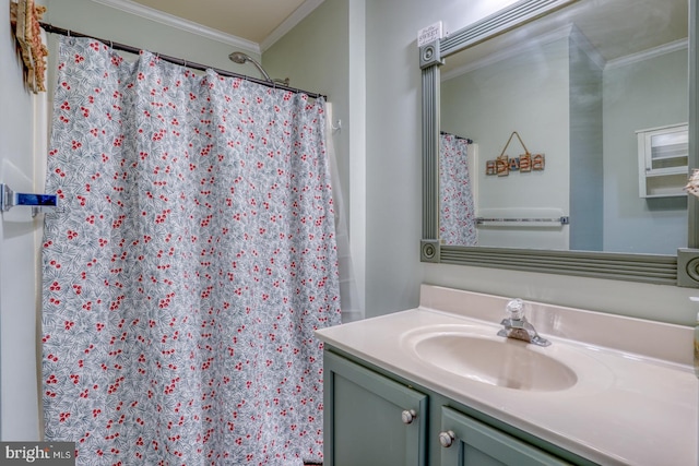 bathroom featuring vanity and ornamental molding