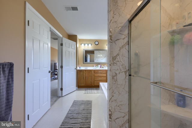 bathroom featuring vanity and walk in shower