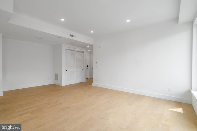 unfurnished room featuring light hardwood / wood-style flooring