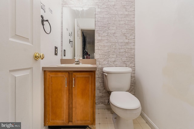 bathroom with tile patterned floors, vanity, and toilet