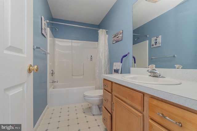 full bathroom with vanity, shower / tub combo, and toilet