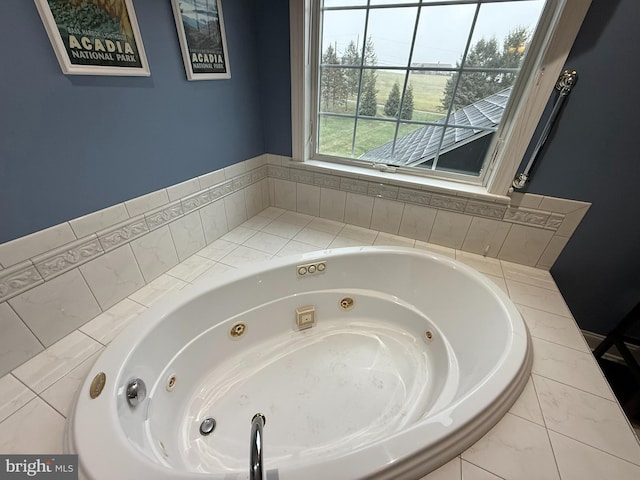 bathroom featuring a relaxing tiled tub