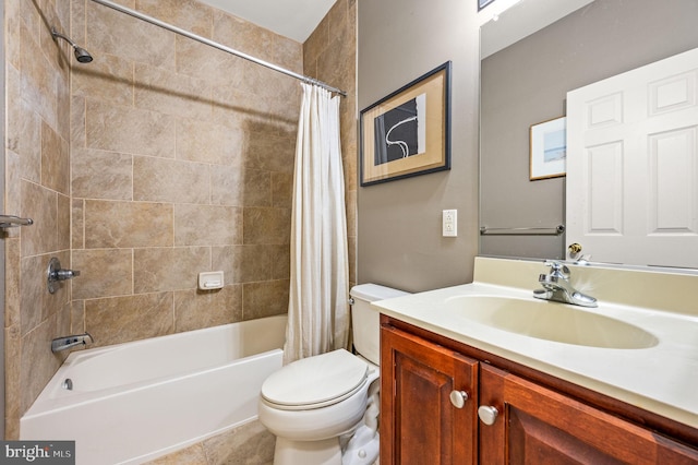 full bathroom with vanity, toilet, and shower / bath combo with shower curtain