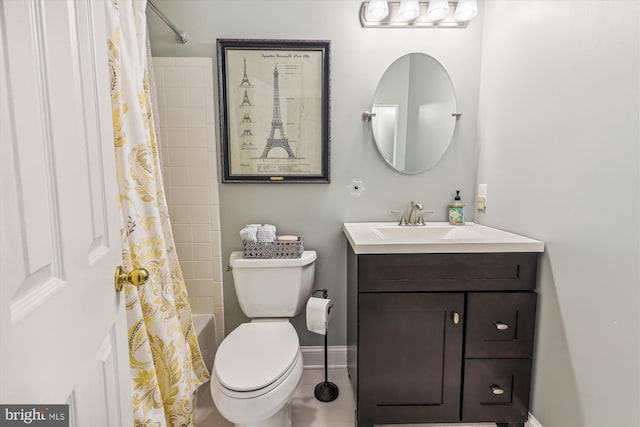 full bathroom featuring vanity, shower / bath combo, and toilet