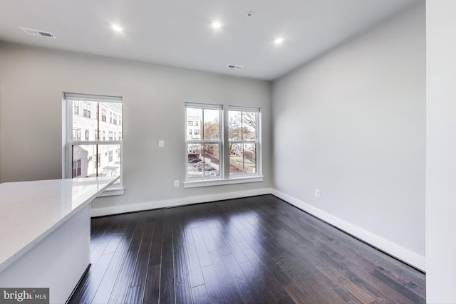 interior space with dark hardwood / wood-style flooring