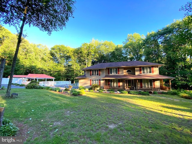 prairie-style home featuring a front yard