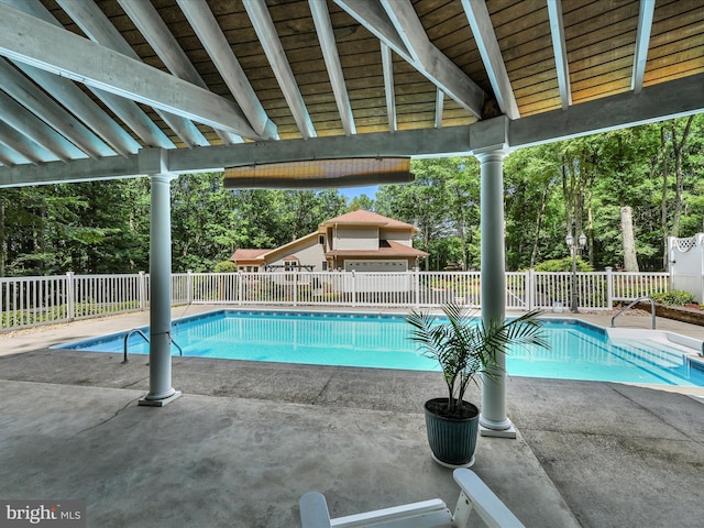 view of pool featuring a patio