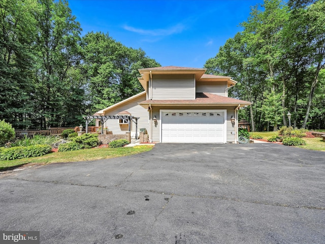 view of front of home featuring a garage