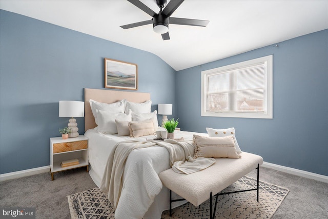 bedroom with carpet flooring, vaulted ceiling, and ceiling fan