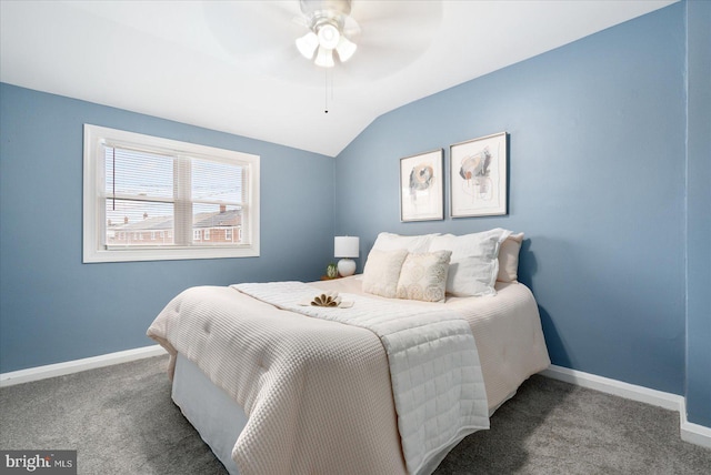 carpeted bedroom featuring ceiling fan and lofted ceiling