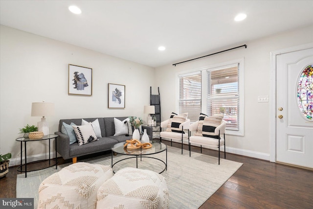 living room featuring dark hardwood / wood-style floors