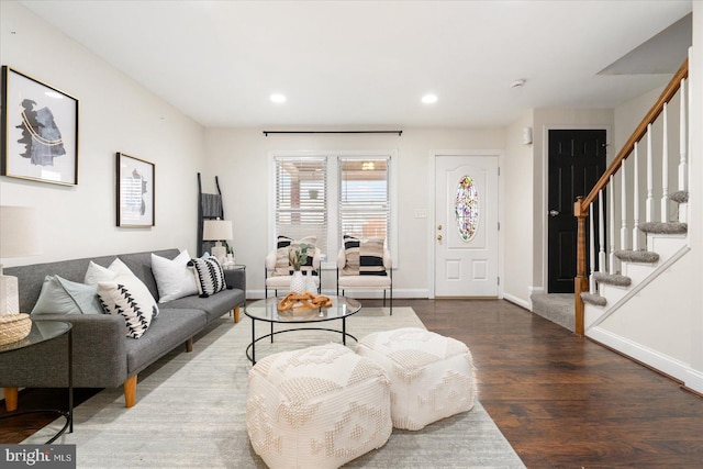 living room with dark hardwood / wood-style floors