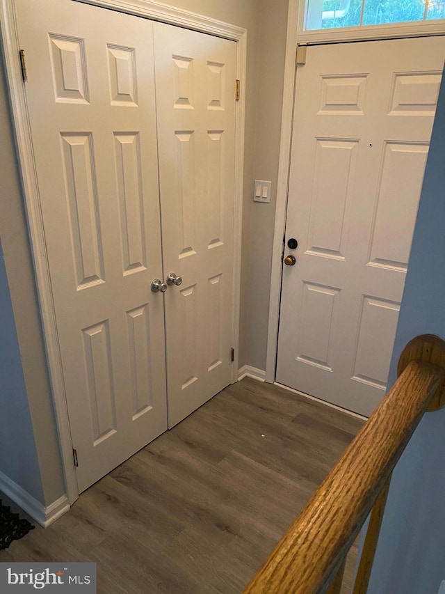 interior space with dark hardwood / wood-style flooring