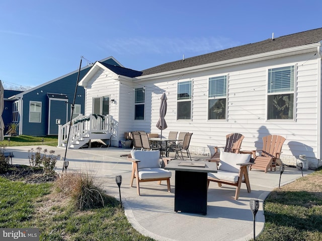 back of house featuring a patio