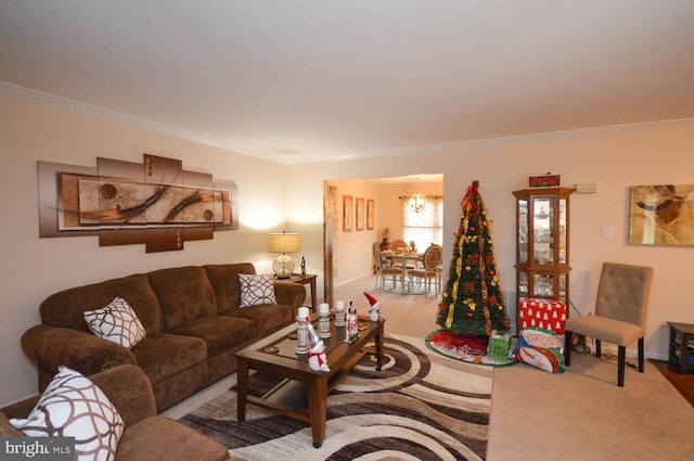 living room with crown molding and carpet floors