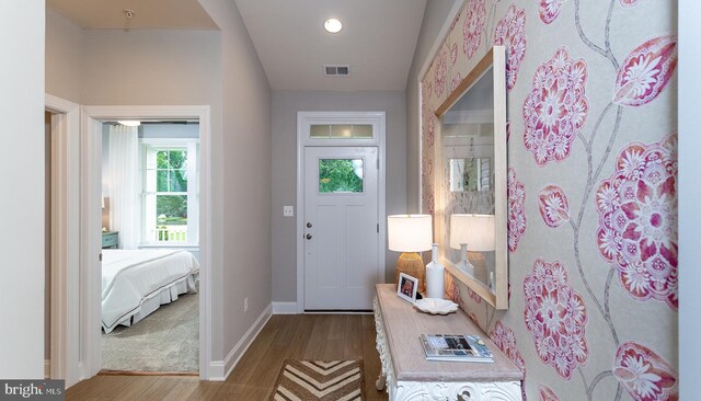 doorway featuring hardwood / wood-style flooring