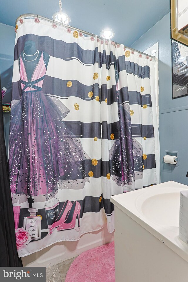 bathroom featuring tile patterned floors and walk in shower