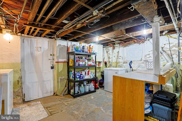 basement featuring fridge