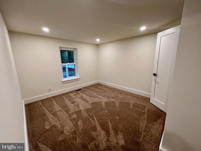 empty room with carpet floors