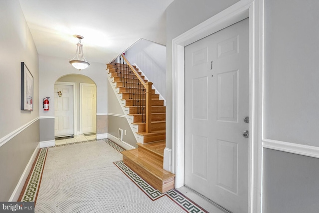 entrance foyer with light tile patterned floors