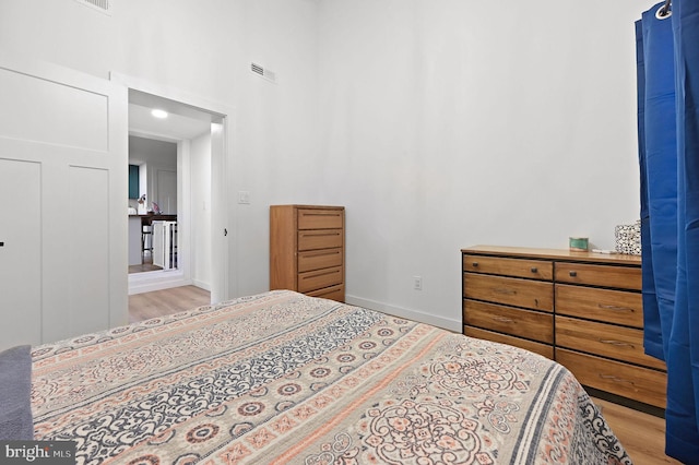 bedroom featuring light wood-type flooring