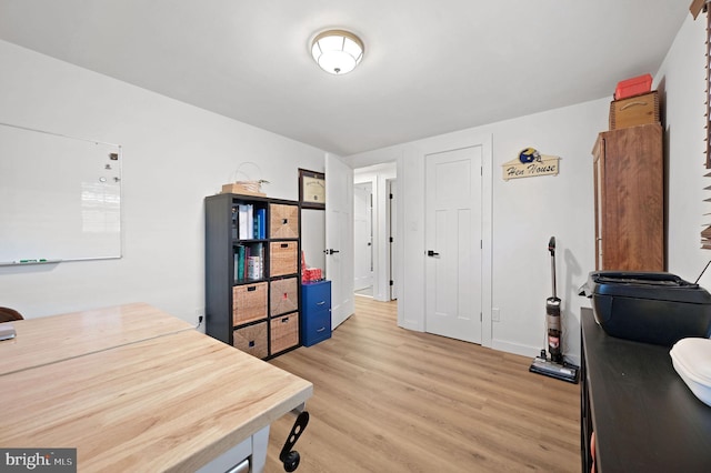 office space featuring light hardwood / wood-style floors