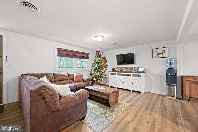 living room featuring light wood-type flooring