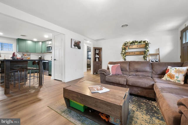 living room featuring light hardwood / wood-style floors