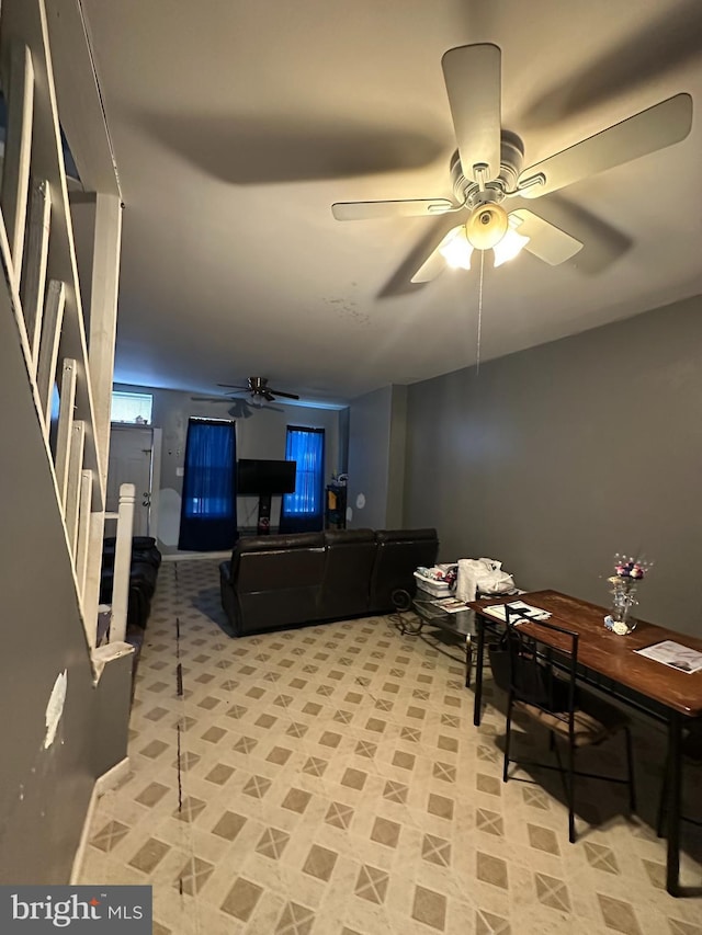 living room with ceiling fan