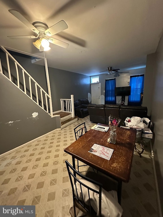 dining area with ceiling fan