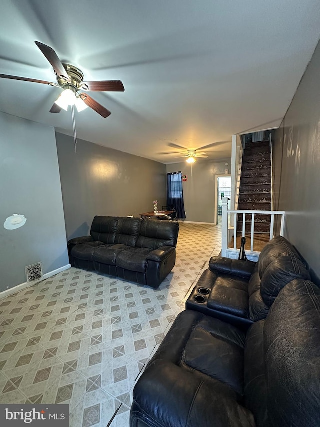 living room with ceiling fan