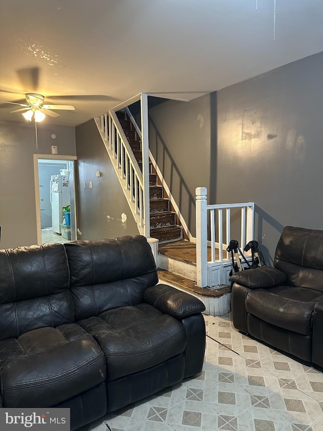 living room featuring ceiling fan