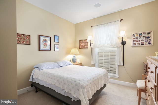 bedroom featuring carpet