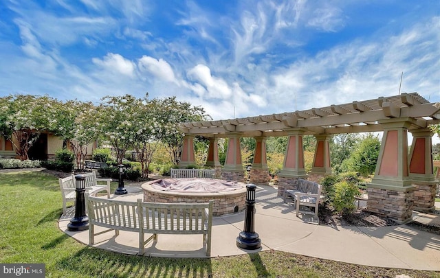 view of patio / terrace with a pergola and an outdoor fire pit