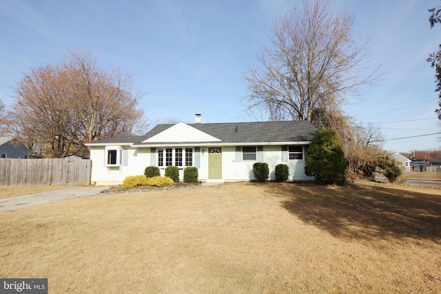 ranch-style home with a front yard