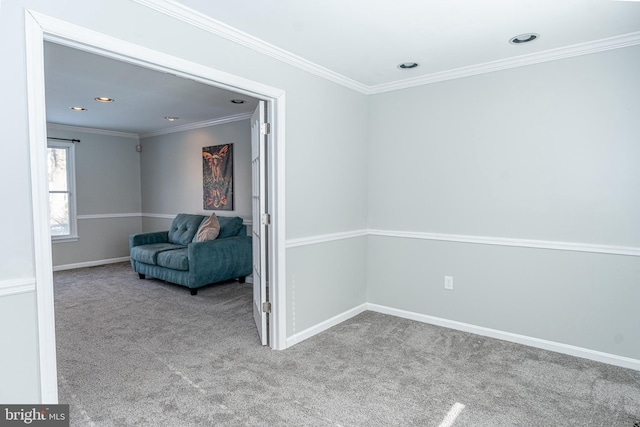 unfurnished room featuring light carpet and ornamental molding