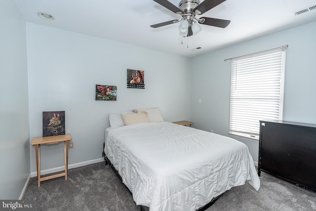 carpeted bedroom featuring ceiling fan