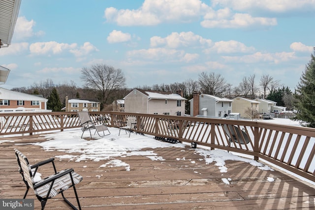 view of snow covered deck