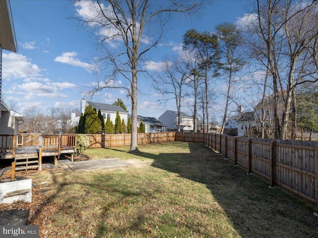 view of yard with a deck and a patio area