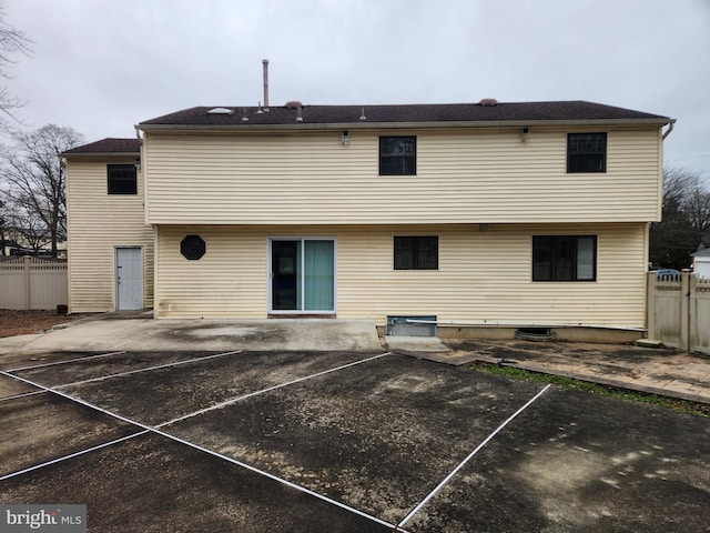 rear view of property with a patio area