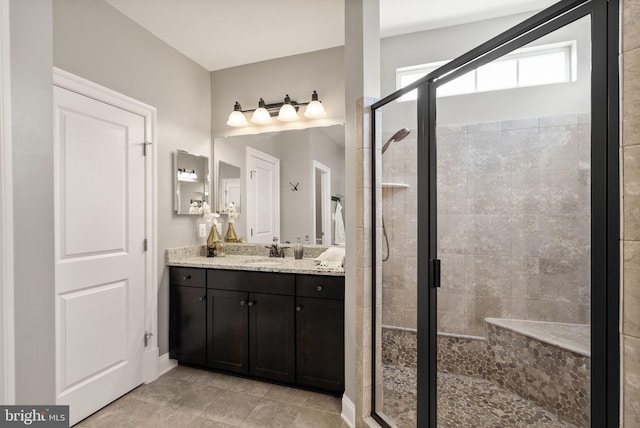 bathroom featuring vanity and walk in shower