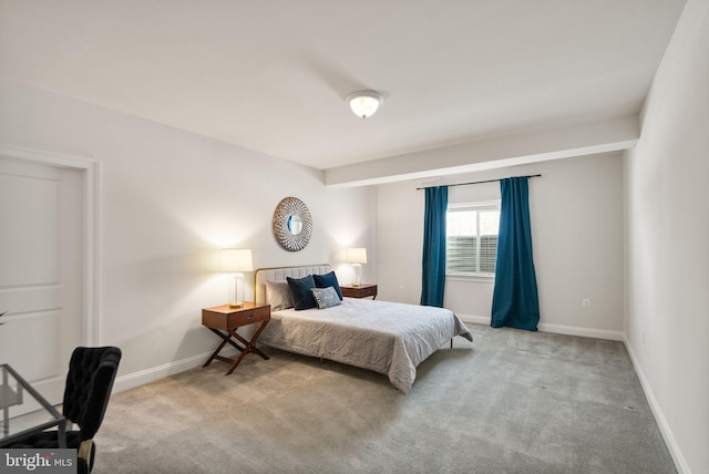 bedroom featuring light carpet