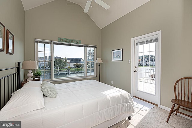 bedroom with ceiling fan, carpet floors, a water view, high vaulted ceiling, and access to exterior